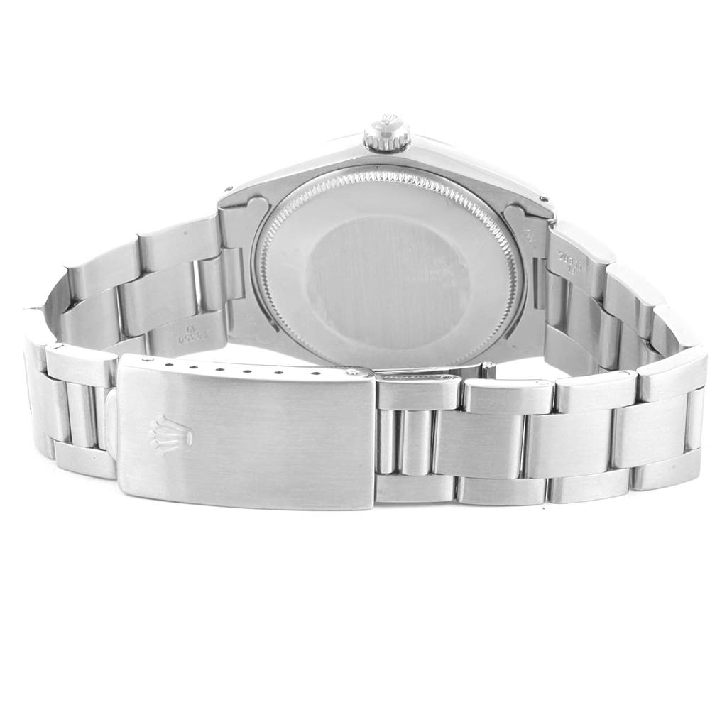 This image shows the back view of a Rolex Vintage Collection 1002 Men's Stainless Steel Grey Dial 1002 Men's Stainless Steel Grey Dial watch, highlighting its case back and bracelet clasp.
