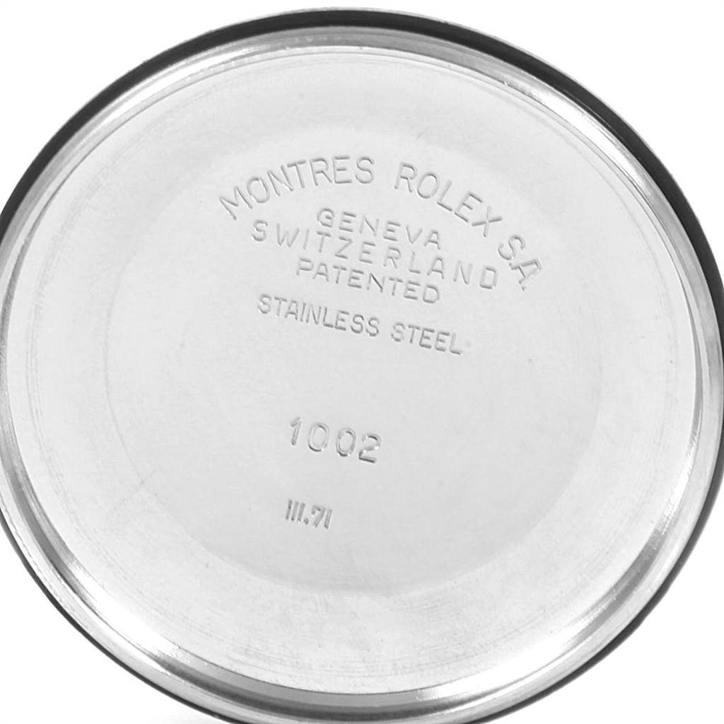 The image shows the inside of the stainless steel case back of a Rolex Vintage Collection 1002 Men's Stainless Steel Grey Dial 1002 Men's Stainless Steel Grey Dial watch with model number 1002.