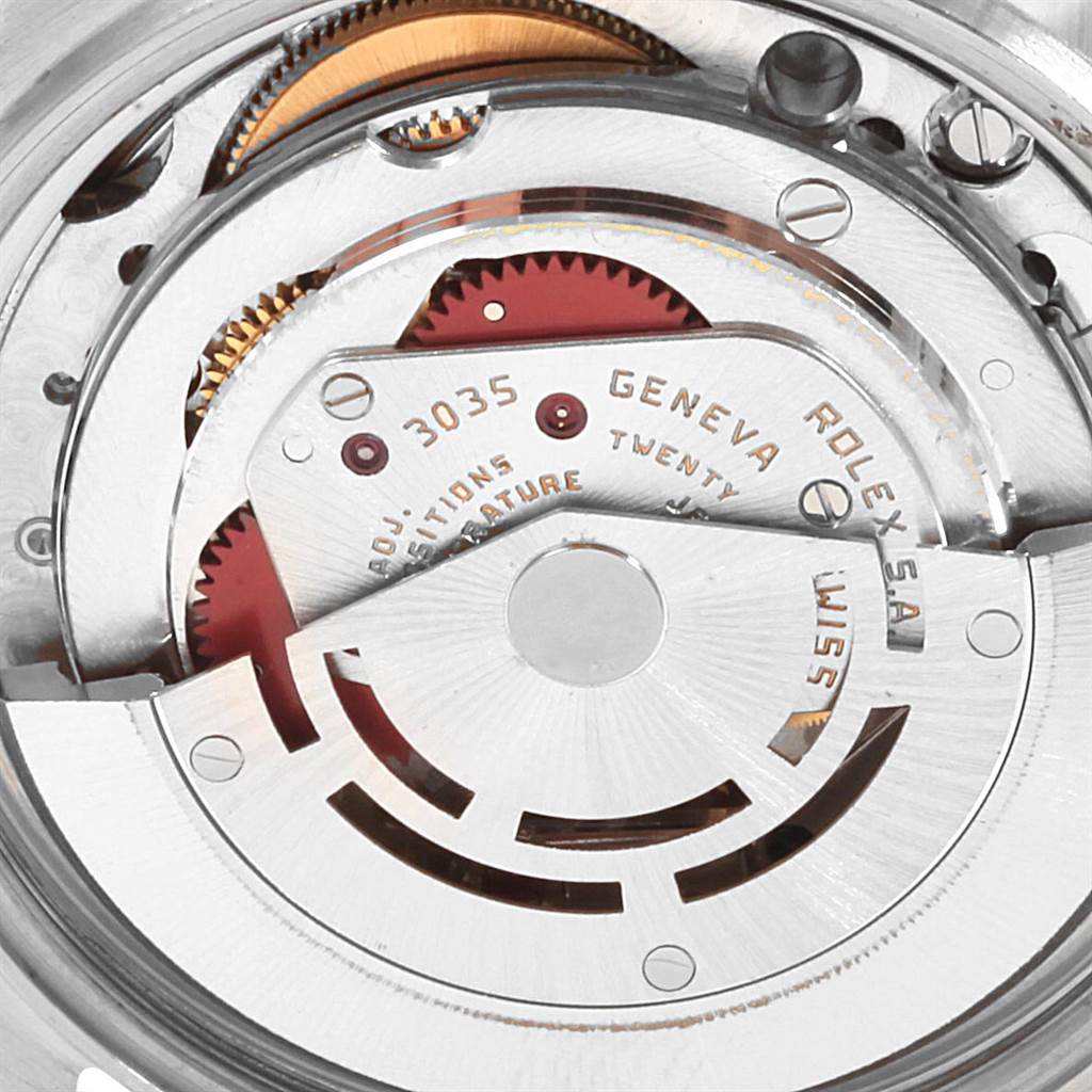 This image shows a close-up view of the movement inside a Rolex Vintage Collection 16013 Men's Stainless Steel Champagne Dial 16013 Men's Stainless Steel Champagne Dial watch, specifically model 3035.
