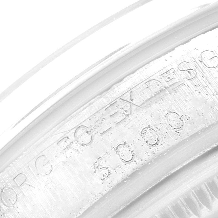 This is a close-up shot showing the engraved caseback edge of the Rolex Vintage Collection 15000 Men's Stainless Steel Silver Dial 15000 Men's Stainless Steel Silver Dial watch.