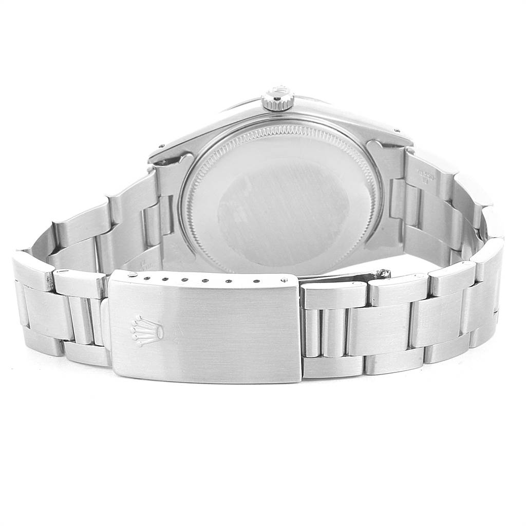 The image shows the back view and clasp of a Rolex Vintage Collection 15000 Men's Stainless Steel Silver Dial 15000 Men's Stainless Steel Silver Dial watch.