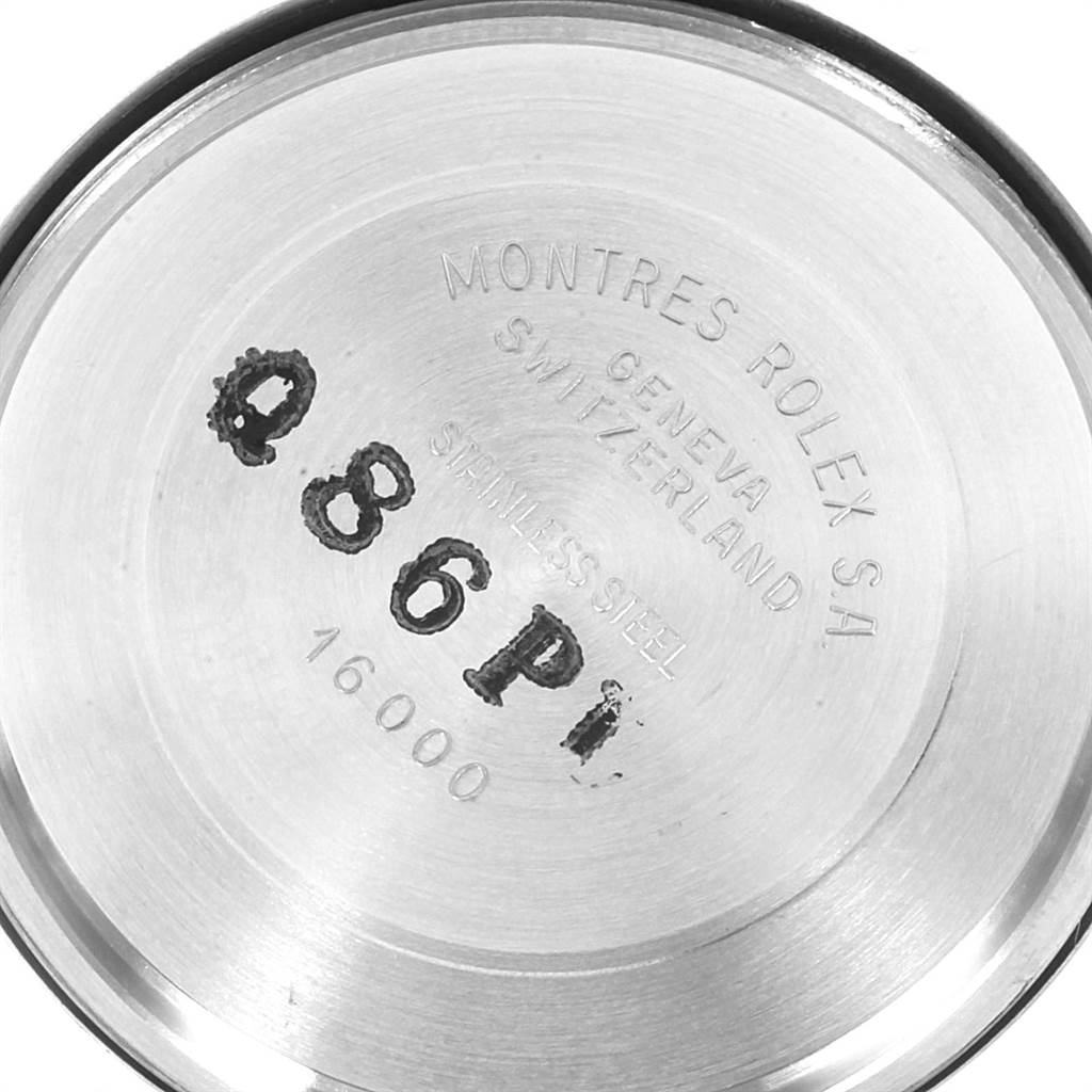 This image shows the inner case back of the Vintage Collection model by Rolex, featuring brand engravings.