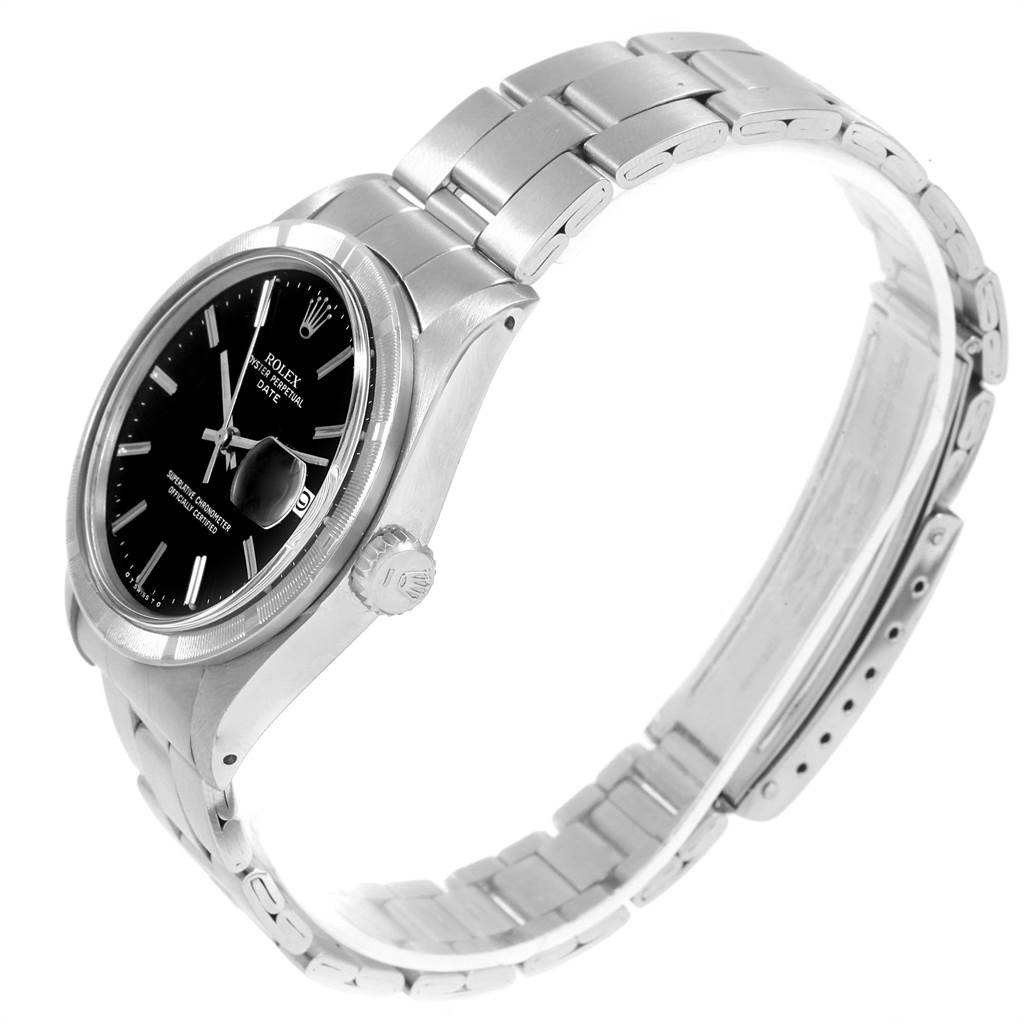 The image shows a side angle of the Rolex Vintage Collection 1501 Men's Stainless Steel Black Dial 1501 Men's Stainless Steel Black Dial watch, focusing on the face, crown, and stainless steel bracelet.