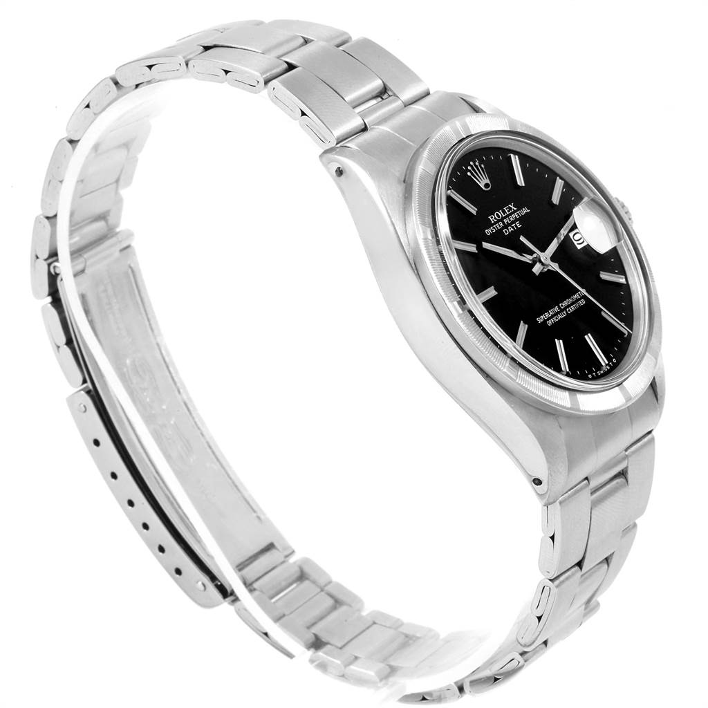 This image shows a side angle of the Rolex Vintage Collection 1501 Men's Stainless Steel Black Dial 1501 Men's Stainless Steel Black Dial watch, highlighting its metal bracelet, case, and black dial.