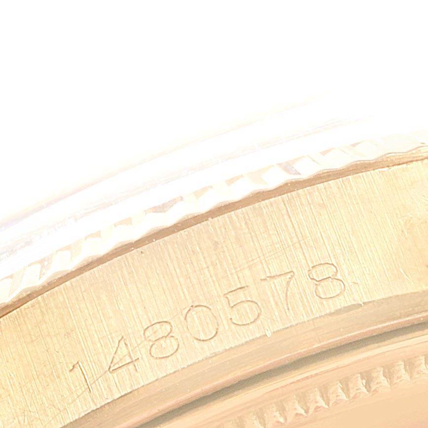The image shows a close-up angle of the serial number on the case of a Vintage Collection model by Rolex.