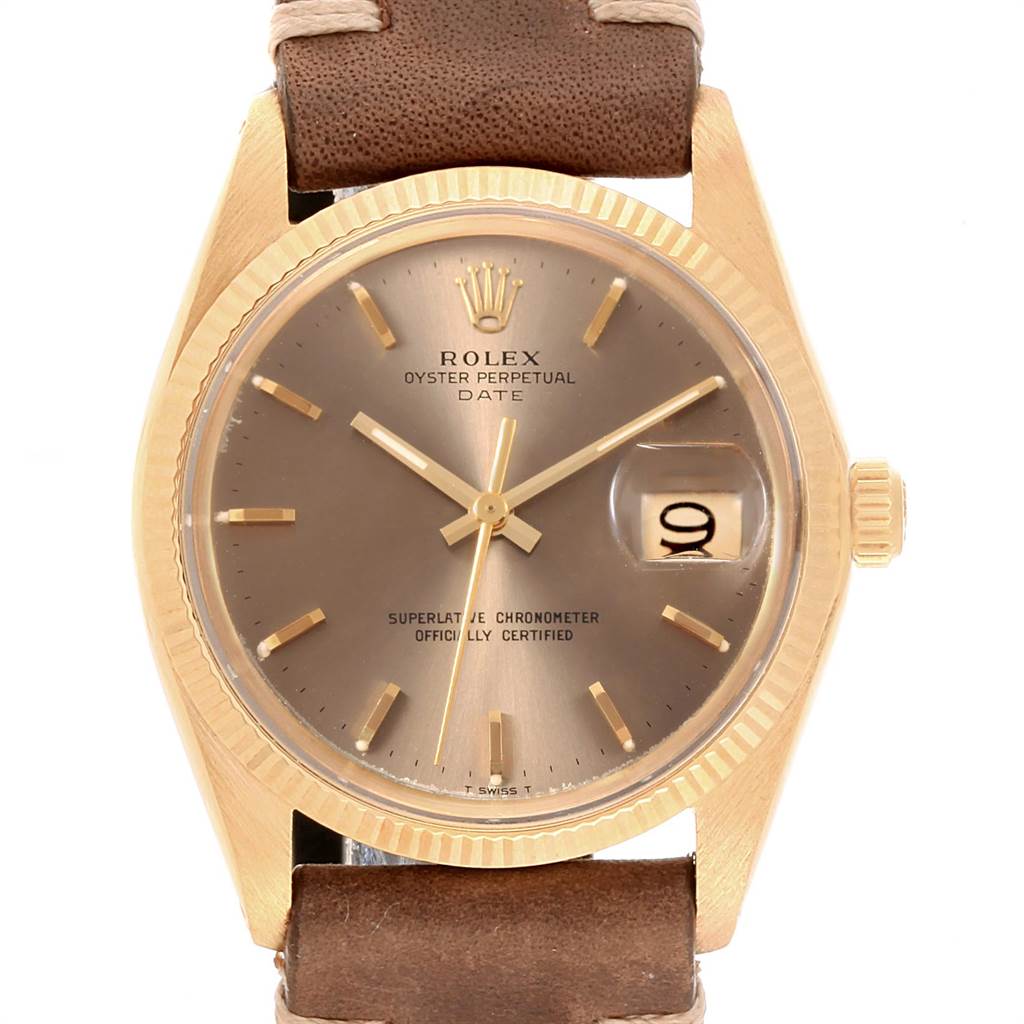 The Vintage Collection Rolex watch is shown from a straight-on angle, highlighting its face, crown, and leather strap.