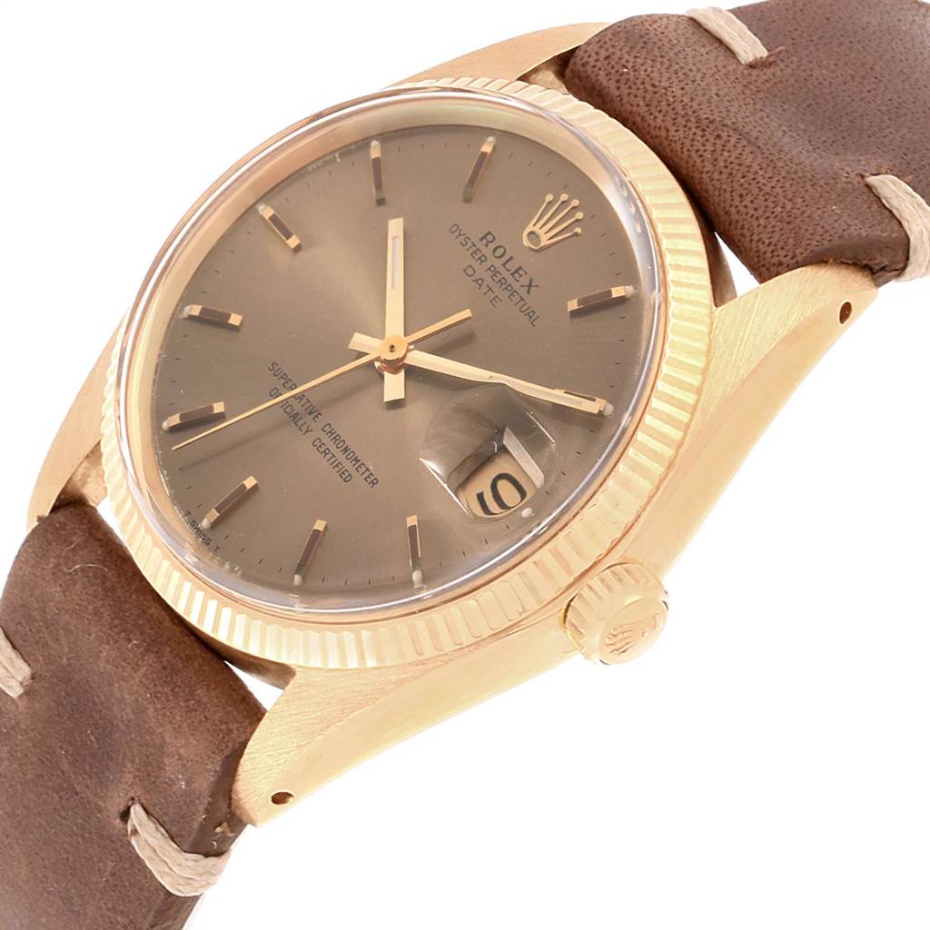 The image shows a side view of a Vintage Collection model by Rolex, displaying the dial, bezel, crown, and leather strap.