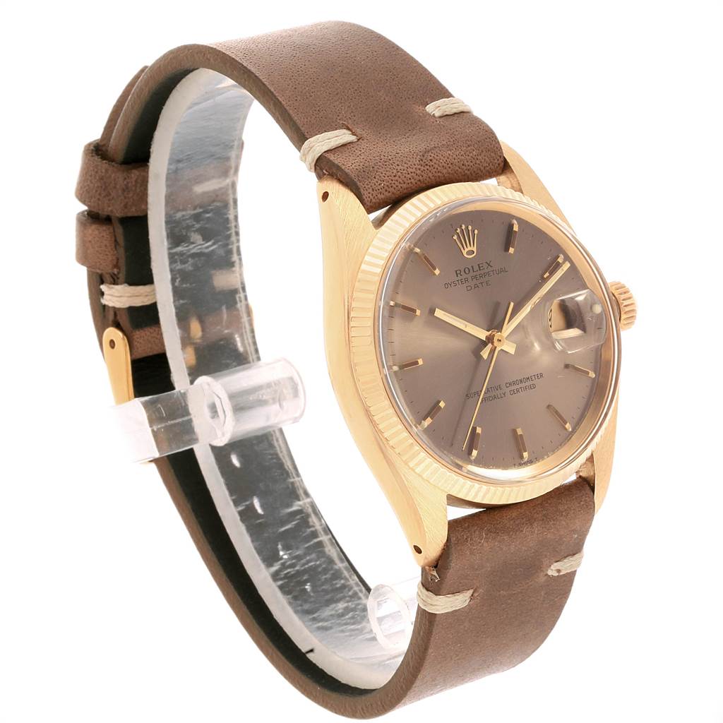 The image shows a side angle of the Rolex Vintage Collection 1503 Men's Yellow Gold Brown Dial 1503 Men's Yellow Gold Brown Dial watch, highlighting the dial, bezel, crown, and leather strap.