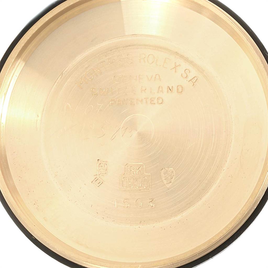 This image shows the inside case back of the Rolex Vintage Collection 1503 Men's Yellow Gold Brown Dial 1503 Men's Yellow Gold Brown Dial model, displaying its engravings and hallmarks.