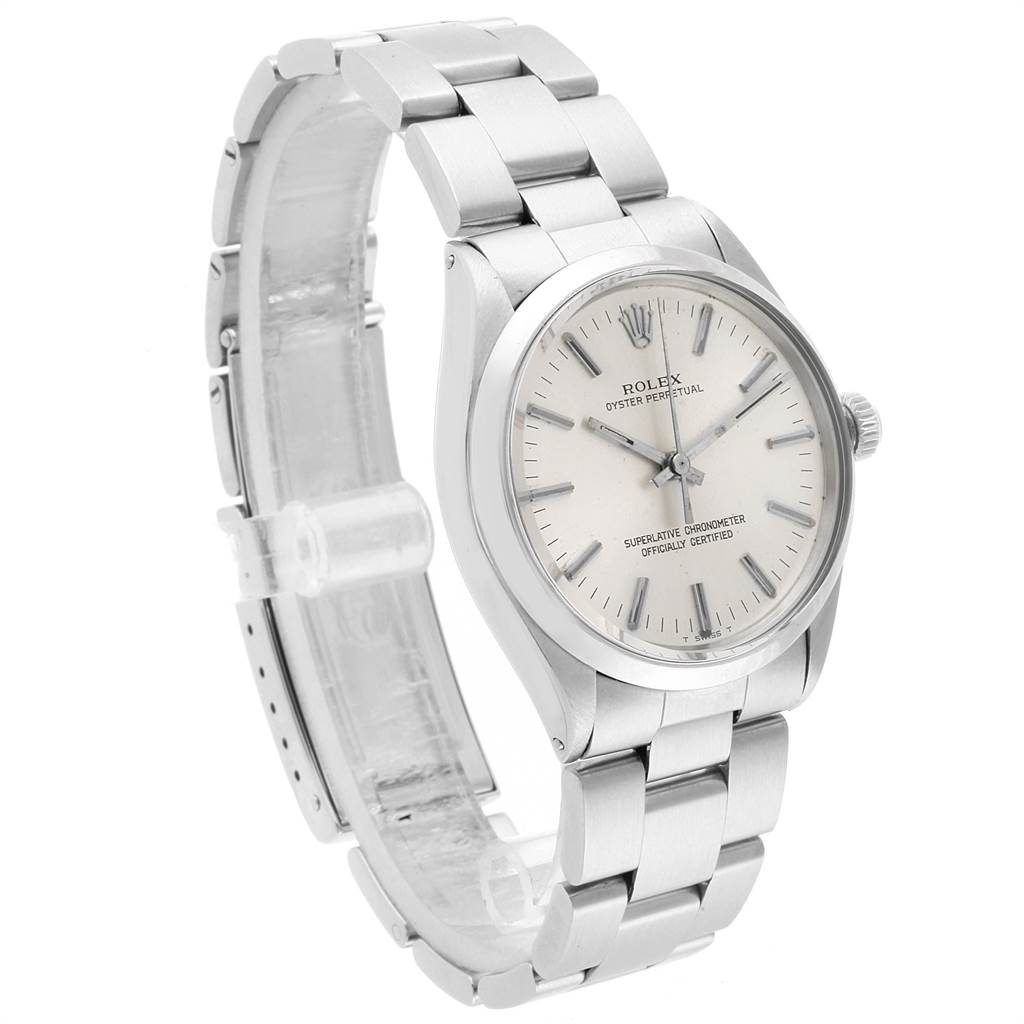 The Vintage Collection Rolex watch is shown at a three-quarter angle, highlighting its bracelet, case, dial, and crown.