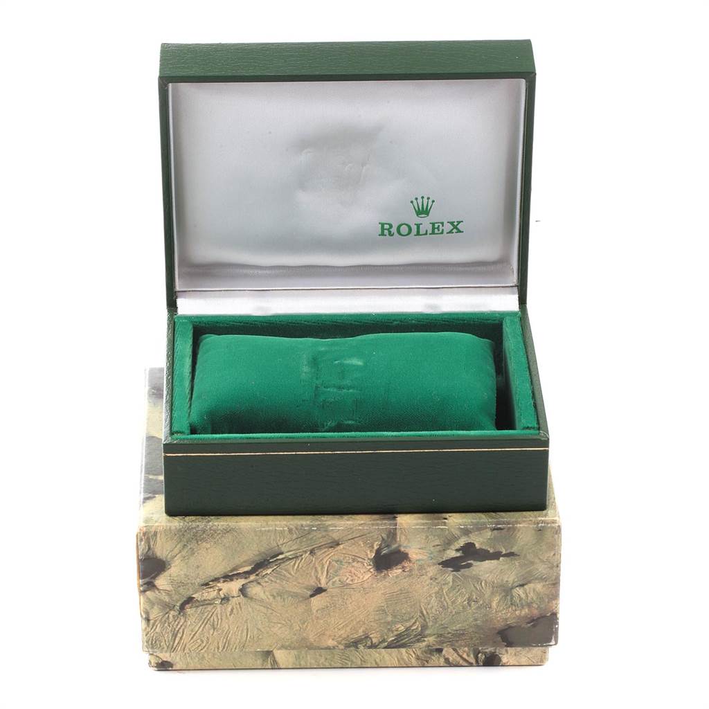 The image shows an open box with a green cushion inside, meant for the Rolex Vintage Collection 16014 Men's Stainless Steel Silver Dial 16014 Men's Stainless Steel Silver Dial model watch.