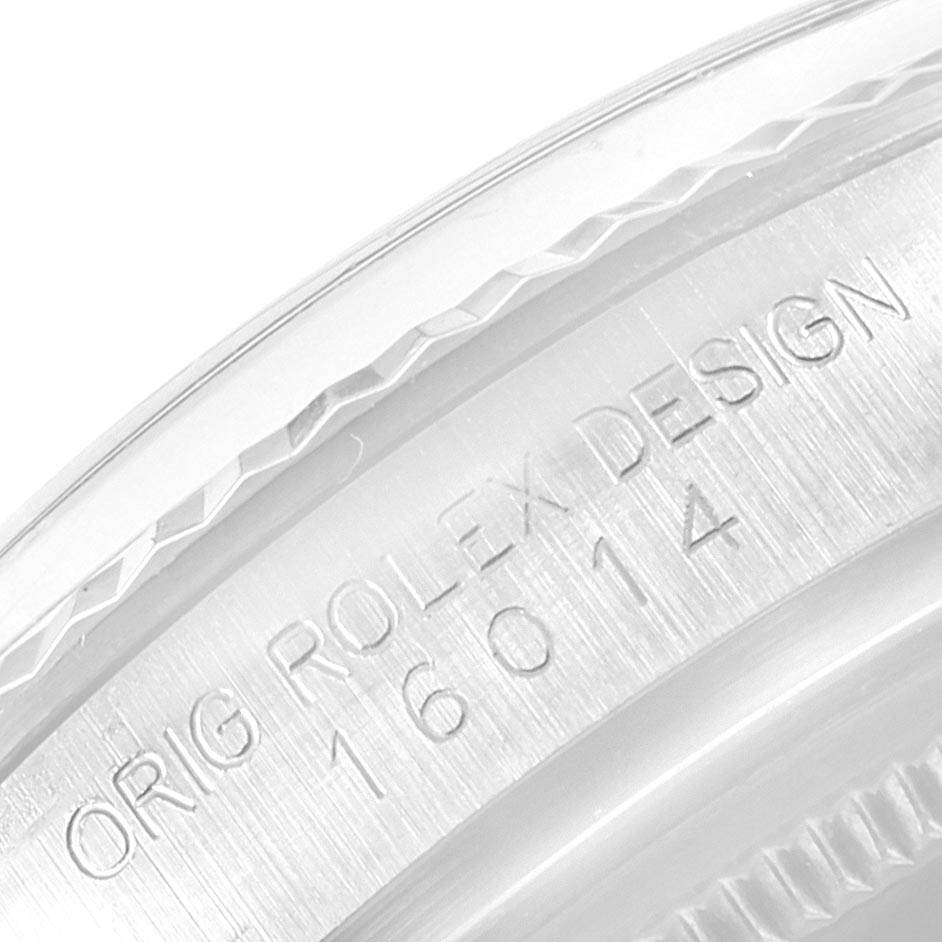 This close-up image shows the engraved serial number and "ORIG ROLEX DESIGN" text on the side of a Vintage Collection Rolex watch case.