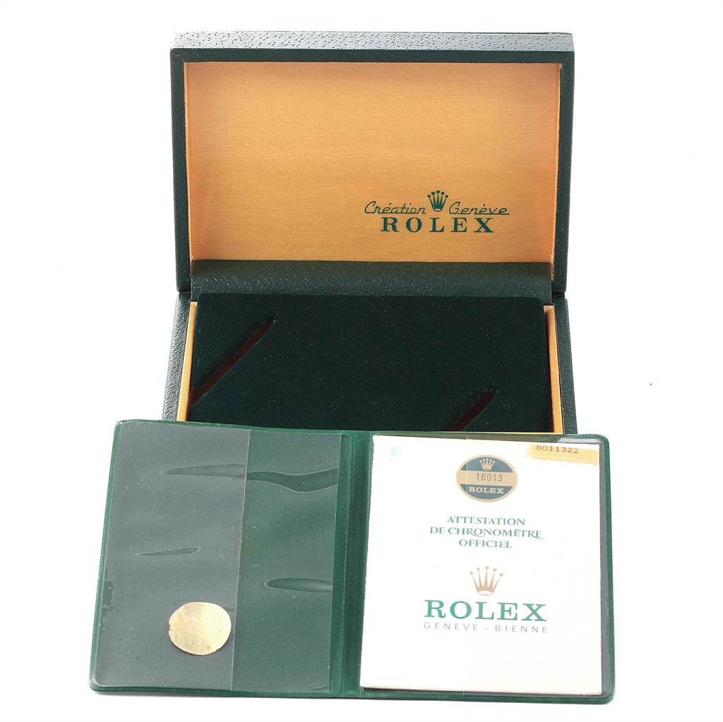 The image shows an open box and documentation for the Rolex Vintage Collection 16013 Men's Stainless Steel Champagne Dial 16013 Men's Stainless Steel Champagne Dial model.