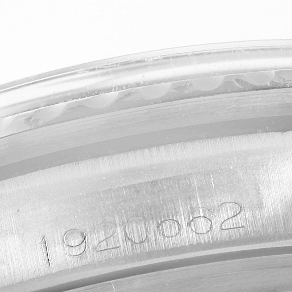 The image shows a close-up of the serial number engraving on the edge of the bezel of a Rolex Vintage Collection 5513 Men's Stainless Steel Black Dial 5513 Men's Stainless Steel Black Dial watch.
