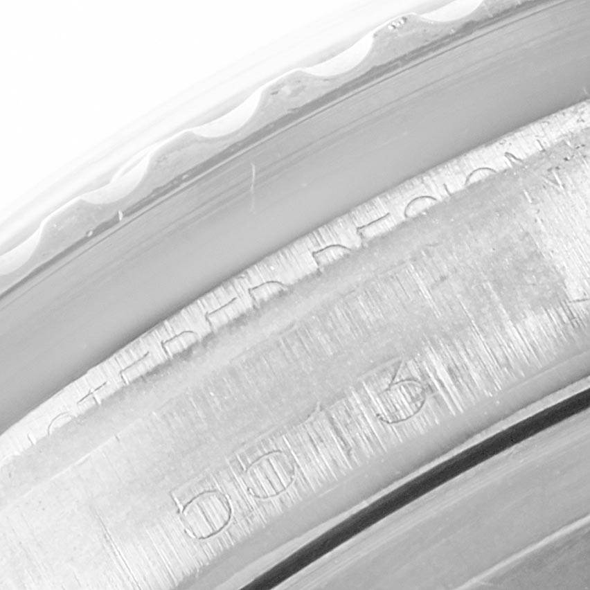 This image shows a close-up of the engraved serial numbers on the case of a Rolex Vintage Collection 5513 Men's Stainless Steel Black Dial 5513 Men's Stainless Steel Black Dial watch.