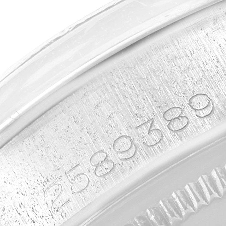 This image shows a close-up of the serial number engraved on the case of a Rolex Vintage Collection 1500 Men's Stainless Steel Silver Dial 1500 Men's Stainless Steel Silver Dial watch.