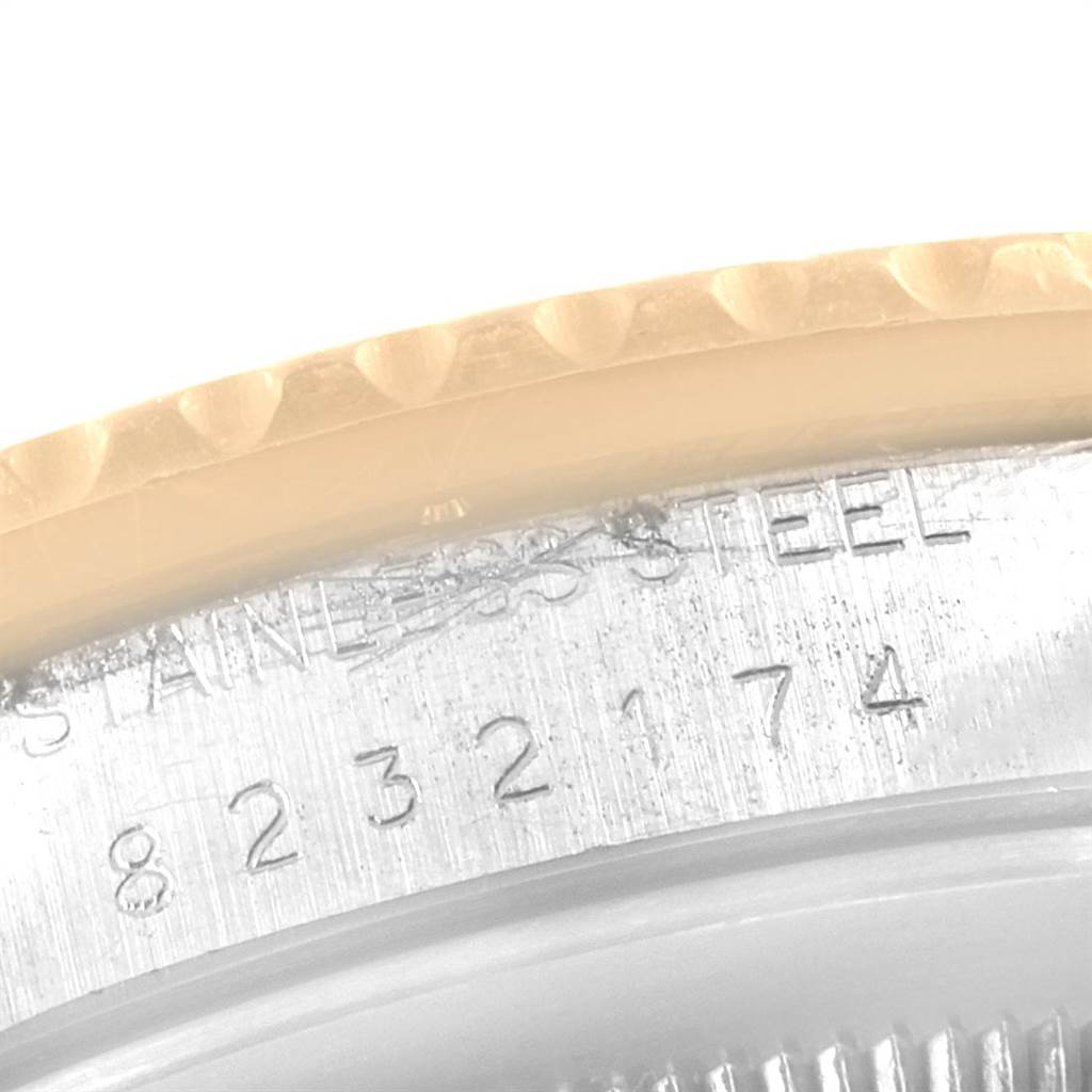 This close-up image shows the serial number engraving on the side of the Rolex Vintage Collection 16753 Men's Stainless Steel Brown Dial 16753 Men's Stainless Steel Brown Dial watch case.