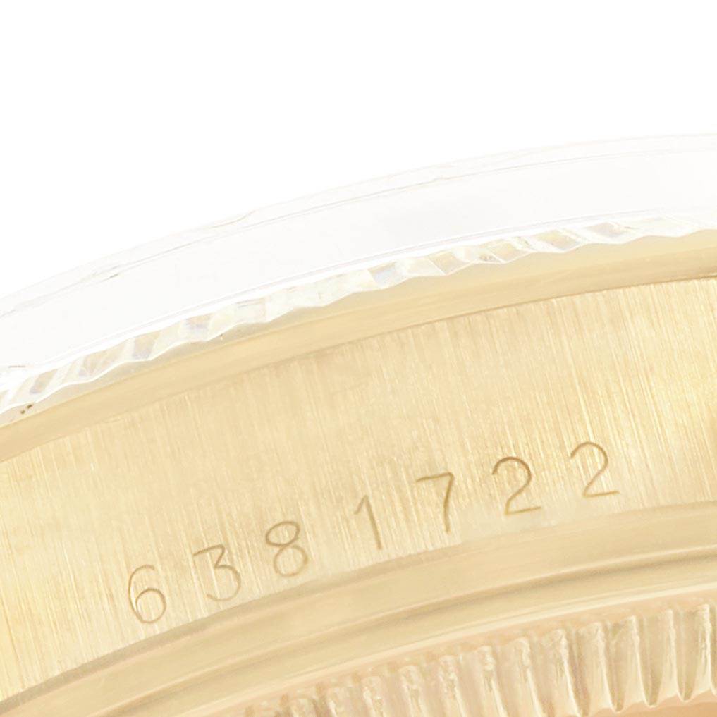 This image shows a close-up of the engraved serial number on the case side of a Rolex Vintage Collection 1503 Men
s Yellow Gold Champagne Dial 1503 Men
s Yellow Gold Champagne Dial watch.