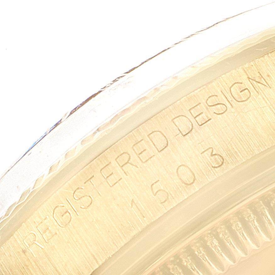 This image shows a close-up of the case side with engraved text on a Vintage Collection model by Rolex.
