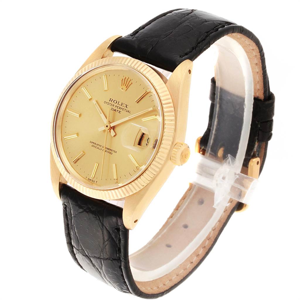 This image shows the Rolex Vintage Collection 1503 Men
s Yellow Gold Champagne Dial 1503 Men
s Yellow Gold Champagne Dial watch at an angled view, highlighting the dial, bezel, and black leather strap.