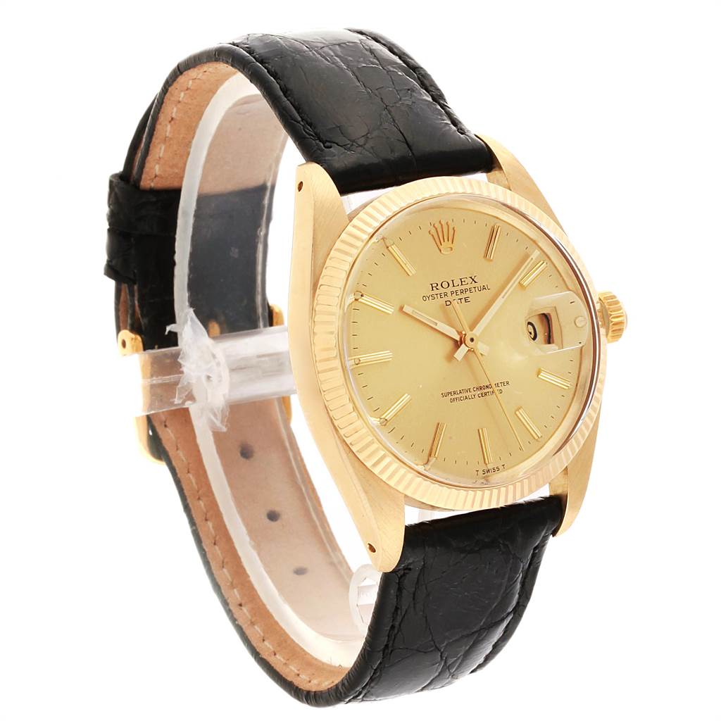 The Vintage Collection Rolex watch is shown at a three-quarter angle, highlighting the gold face, bezel, and black leather strap.