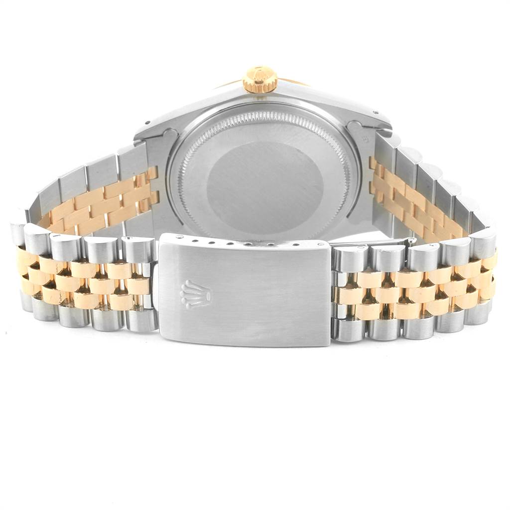 The image shows the back case and bracelet of the Vintage Collection model by Rolex.