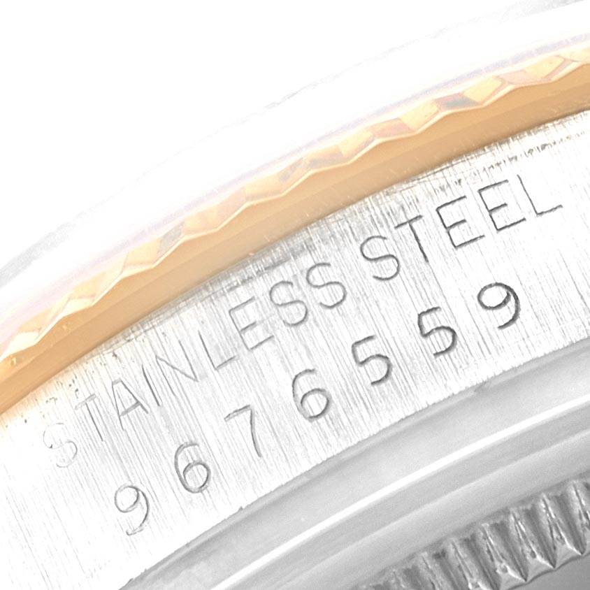 This close-up image shows the side engraving of a Stainless Steel Rolex Vintage Collection 16013 Men's Stainless Steel Champagne Dial 16013 Men's Stainless Steel Champagne Dial model.