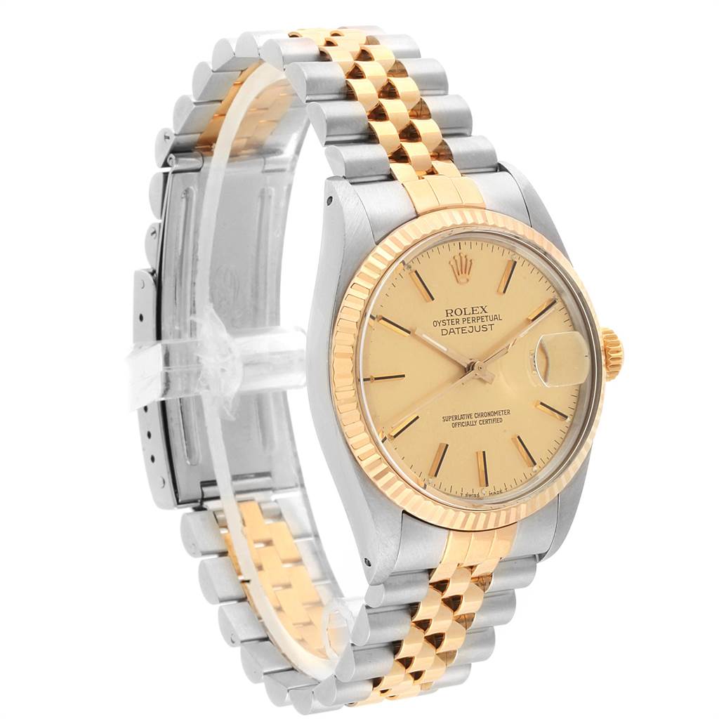The Rolex Vintage Collection 16013 Men's Stainless Steel Champagne Dial 16013 Men's Stainless Steel Champagne Dial watch is shown at a diagonal angle, highlighting its gold bezel, face, and two-tone bracelet.