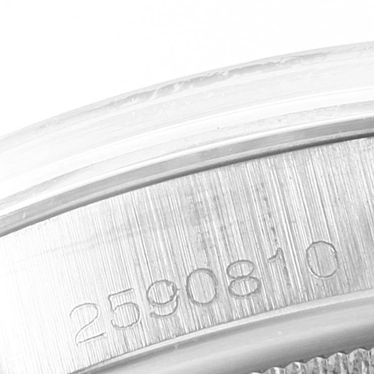 This image shows a close-up of the serial number engraving on the side of a Rolex Vintage Collection 1500 Men's Stainless Steel Blue Dial 1500 Men's Stainless Steel Blue Dial watch case.