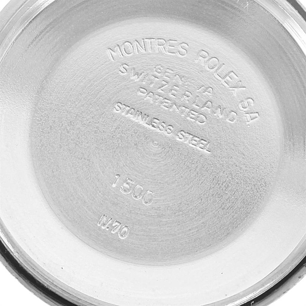 The image shows the inside of the case back of a Vintage Collection Rolex watch, displaying model and material details.