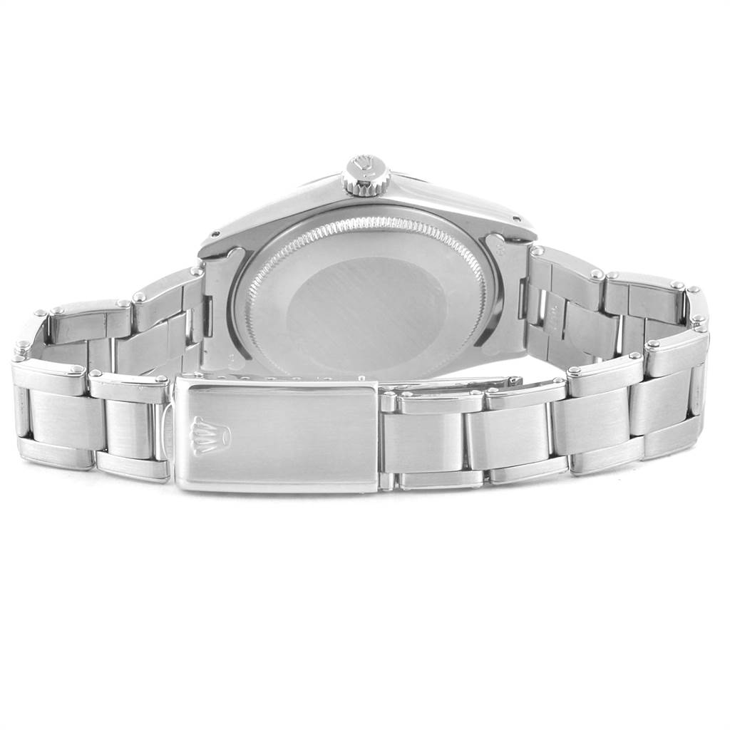 This is a rear view of the Rolex Vintage Collection 1500 Men's Stainless Steel Blue Dial 1500 Men's Stainless Steel Blue Dial watch showcasing its clasp, case back, and bracelet.