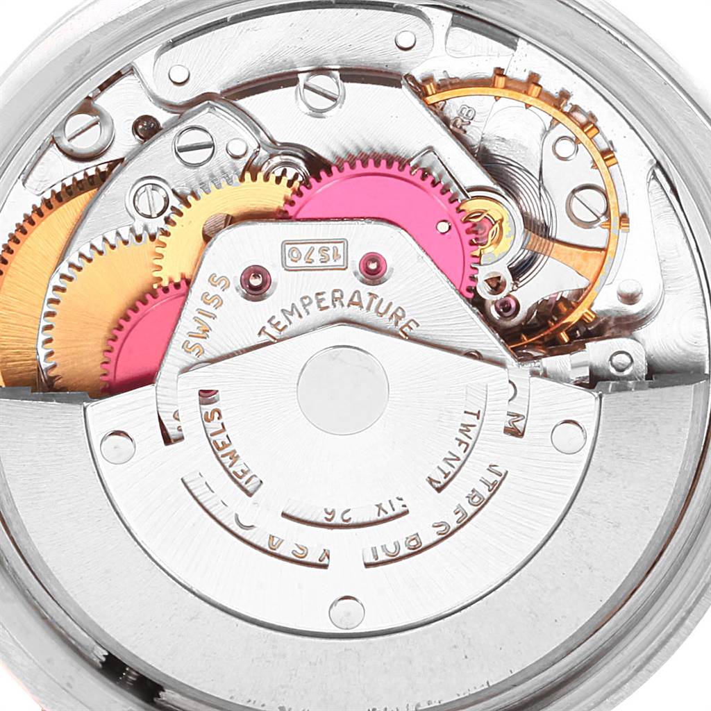 The image shows the intricate internal mechanical movement of a Vintage Collection model by Rolex from a close-up angle.