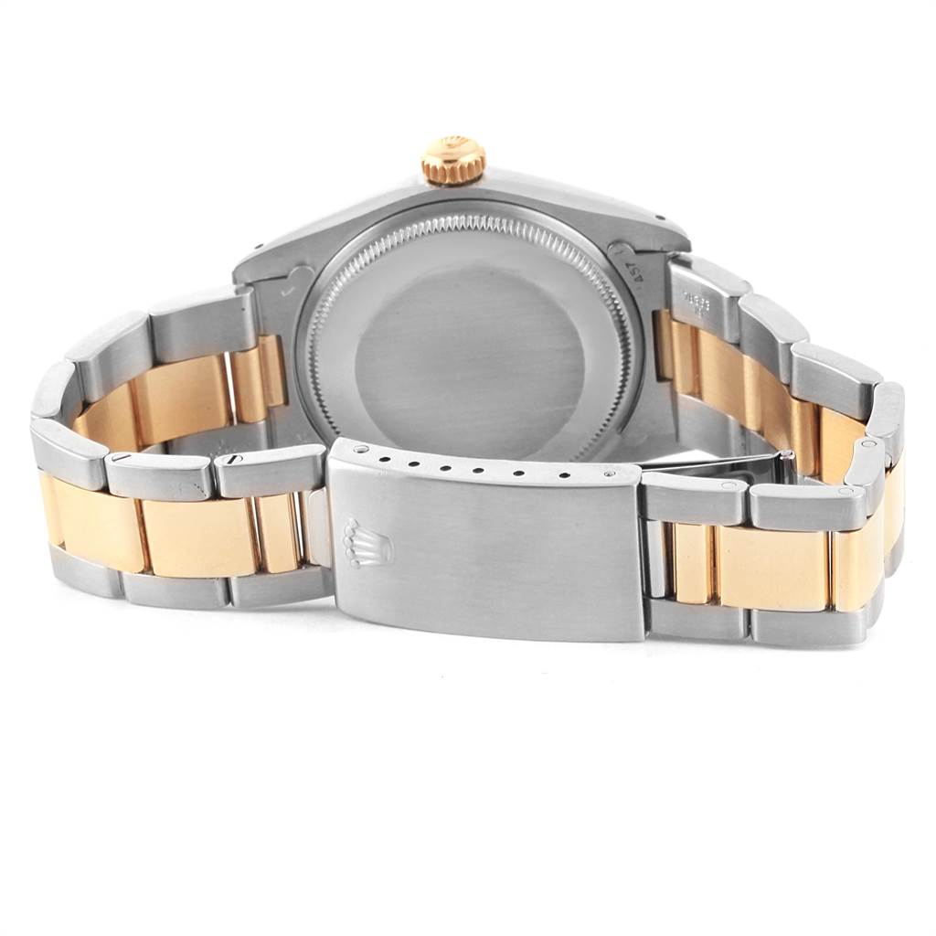 This image shows the back case and bracelet of the Rolex Vintage Collection 1505 Men
s Steel and Gold (two tone) Champagne Dial 1505 Men
s Steel and Gold (two tone) Champagne Dial watch, taken from the rear view.