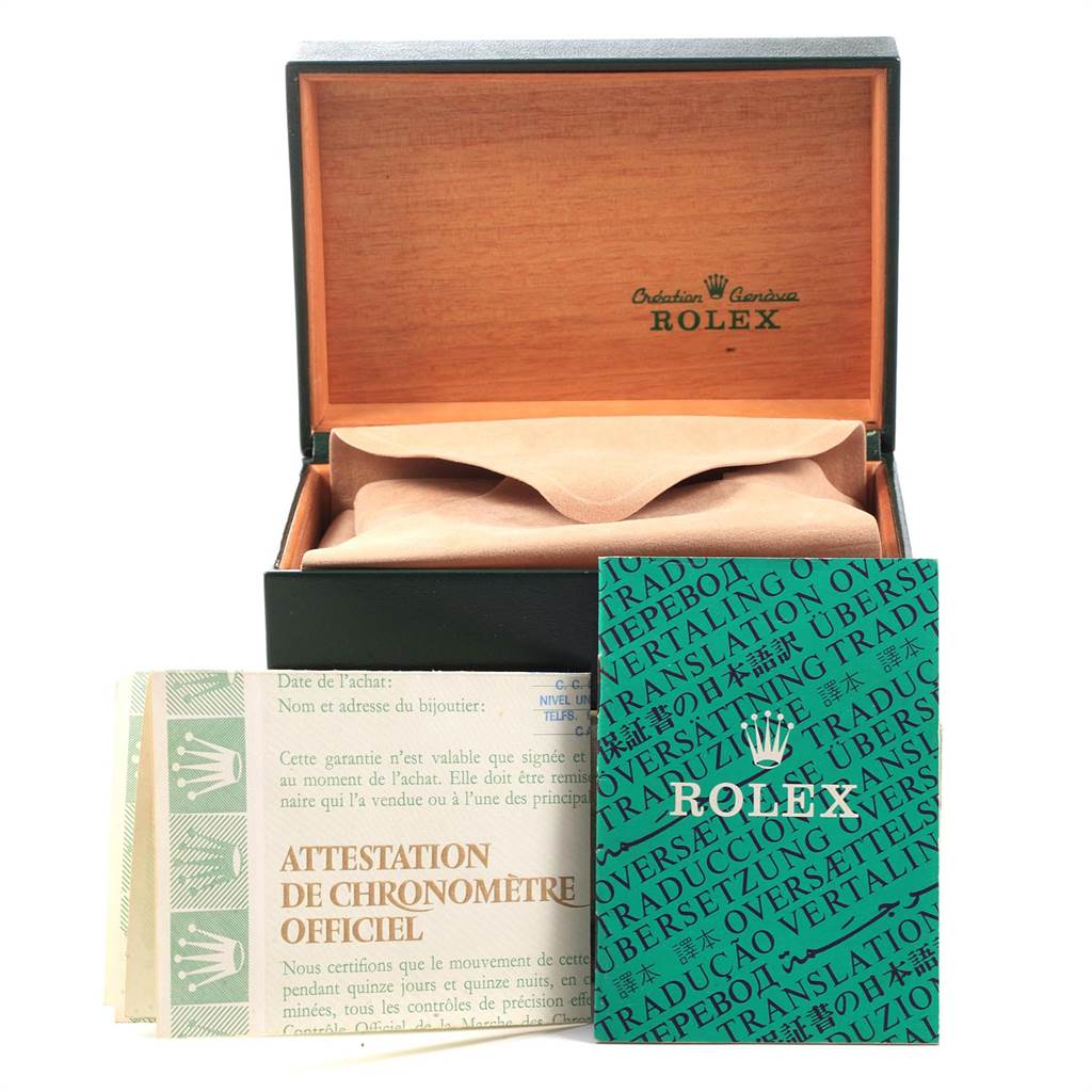 This image shows the Rolex Vintage Collection 1505 Men
s Steel and Gold (two tone) Champagne Dial 1505 Men
s Steel and Gold (two tone) Champagne Dial watch box and accompanying documents from a slightly elevated, front angle.