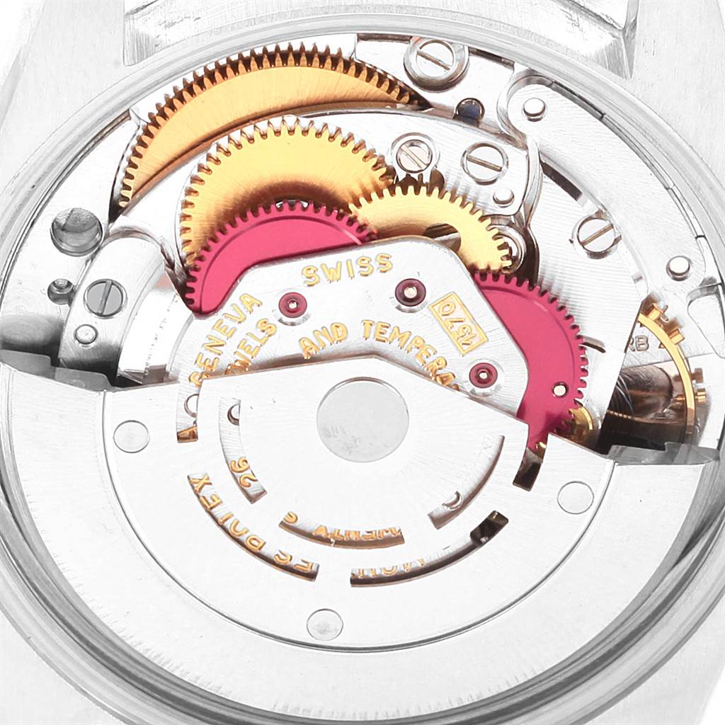 This image shows the intricate internal mechanism of a Rolex Vintage Collection 1501 Men's Stainless Steel Blue Dial 1501 Men's Stainless Steel Blue Dial watch, highlighting the gears and moving parts.