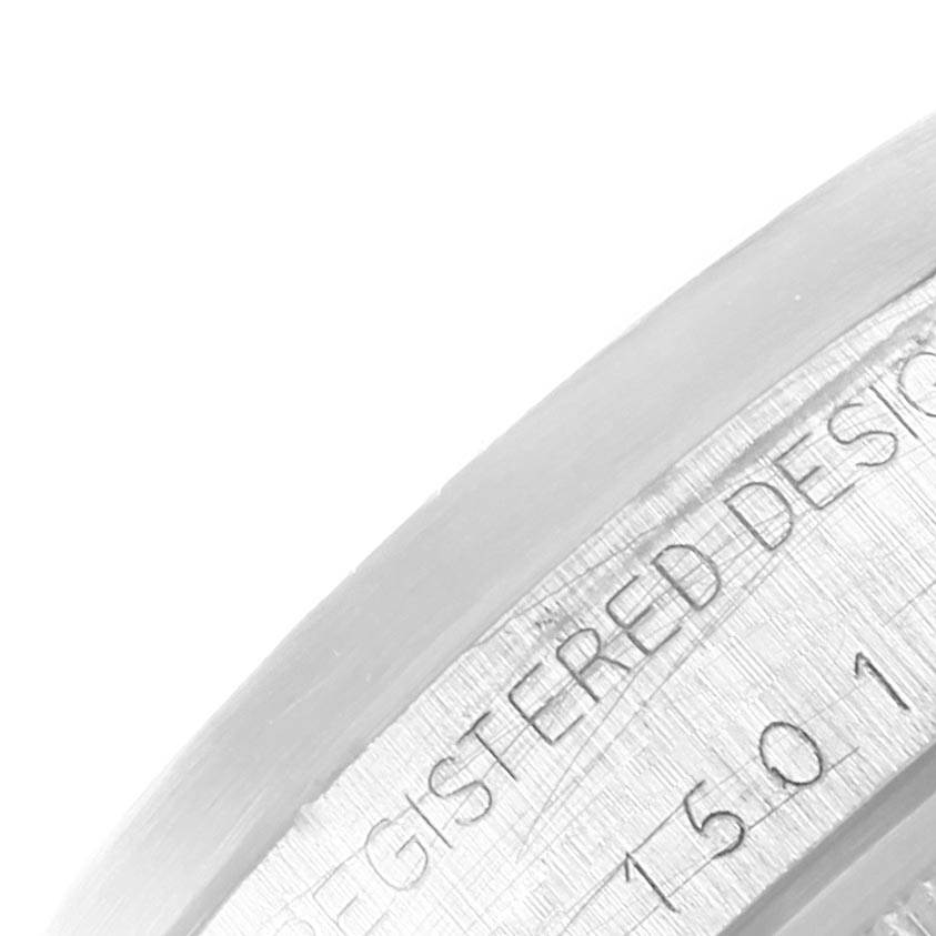 This image shows a close-up view of the engraved bezel of the Vintage Collection model by Rolex.