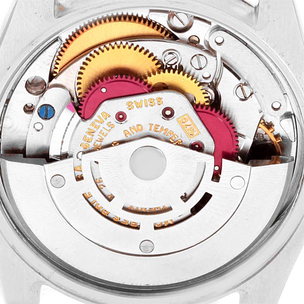 The image shows the back view of a Rolex Vintage Collection 1500 Men's Stainless Steel Black Dial 1500 Men's Stainless Steel Black Dial model watch, displaying its intricate mechanical movement and gears.