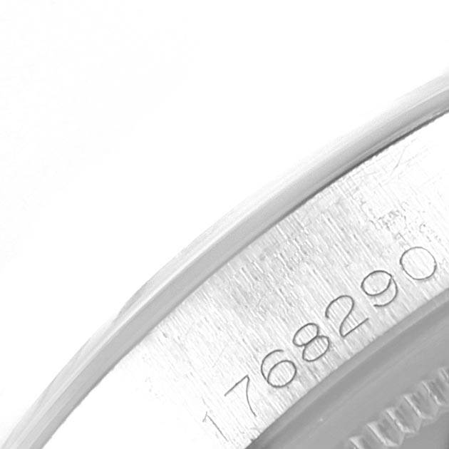 The image shows a close-up of the Rolex Vintage Collection 1500 Men's Stainless Steel White Dial 1500 Men's Stainless Steel White Dial model's serial number engraved on the side of the watch case.
