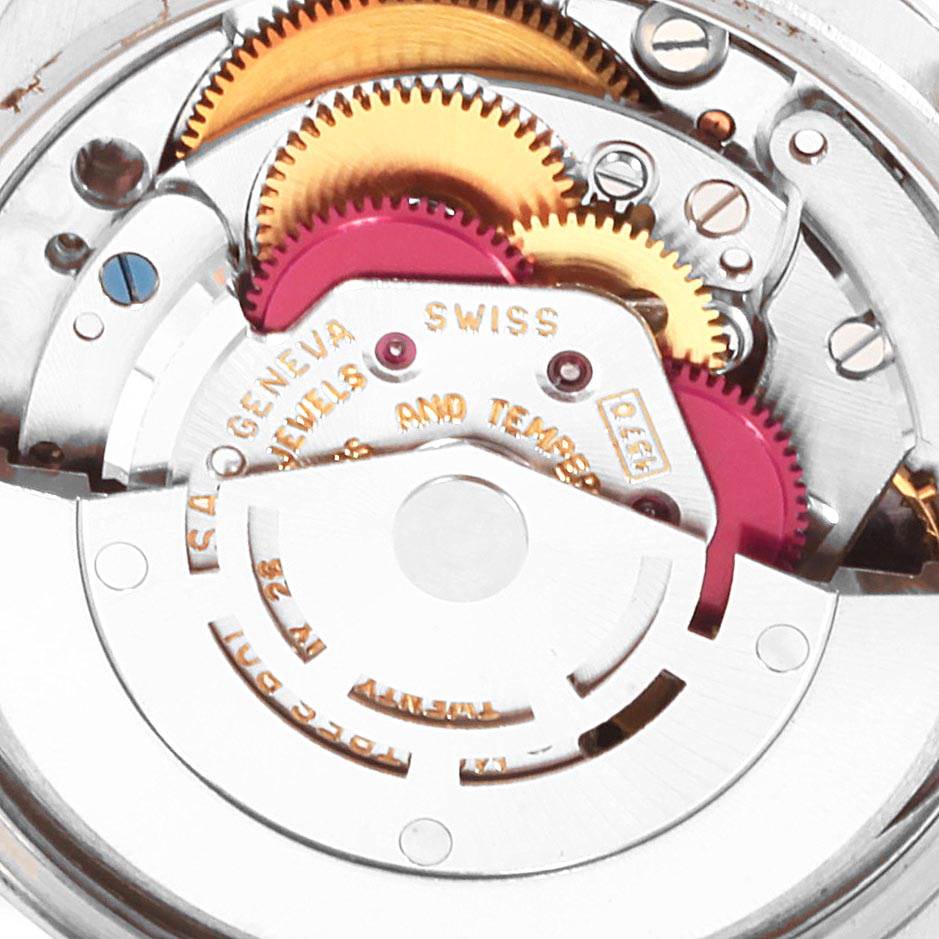 This image shows the internal mechanical movement of a Vintage Collection model by Rolex, highlighting intricate gears and components.