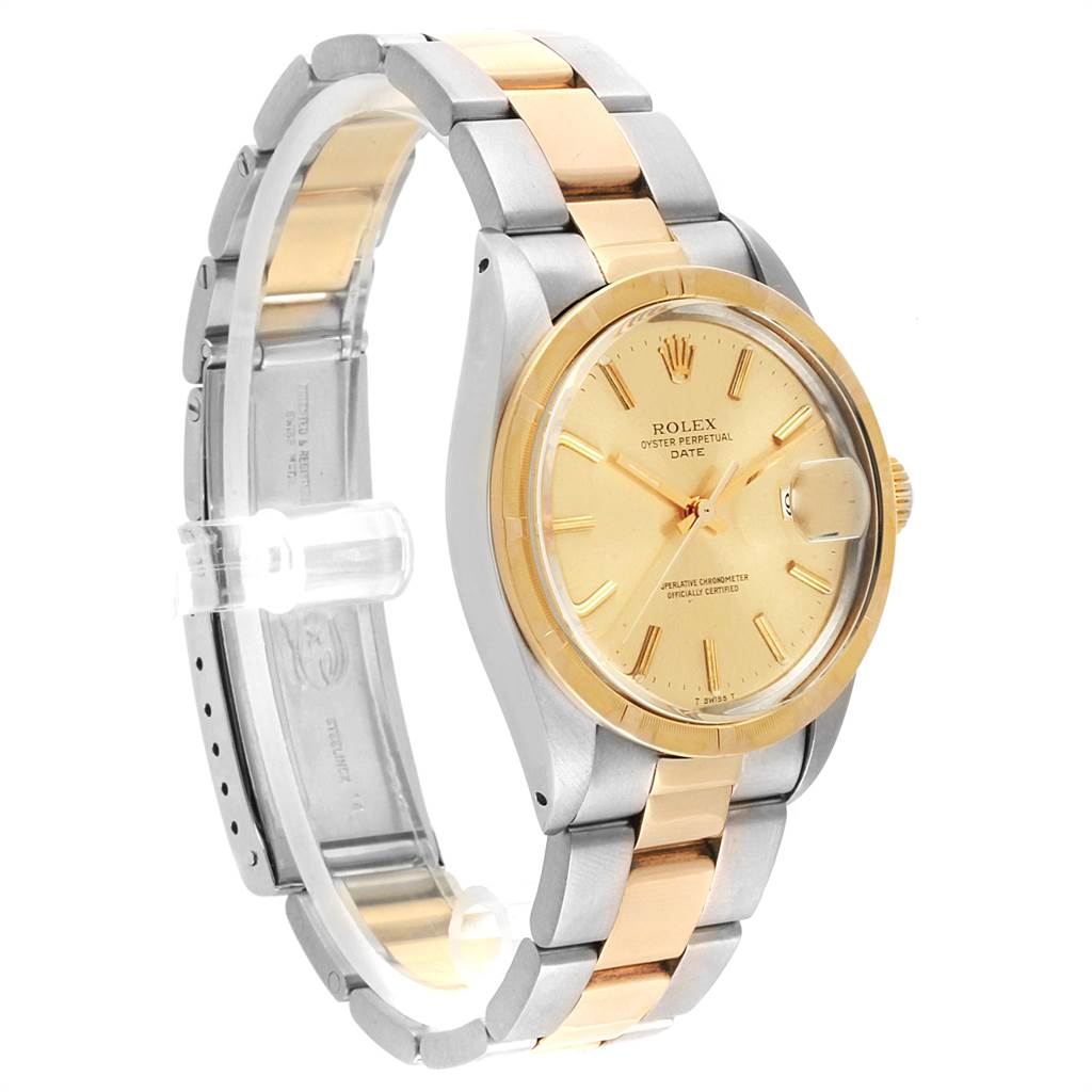 This Rolex Vintage Collection 1500 Men's Steel and Gold (two tone) Champagne Dial 1500 Men's Steel and Gold (two tone) Champagne Dial watch is shown at a slight angle, highlighting its gold and silver bracelet, bezel, and dial.