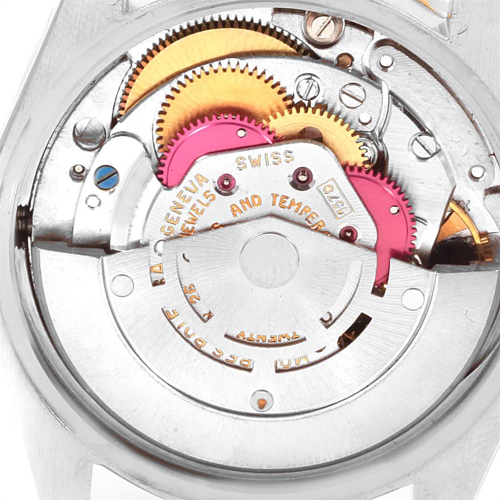 This image shows a close-up of the movement mechanism of a Rolex Vintage Collection 1500 Men's Steel and Gold (two tone) Champagne Dial 1500 Men's Steel and Gold (two tone) Champagne Dial watch.