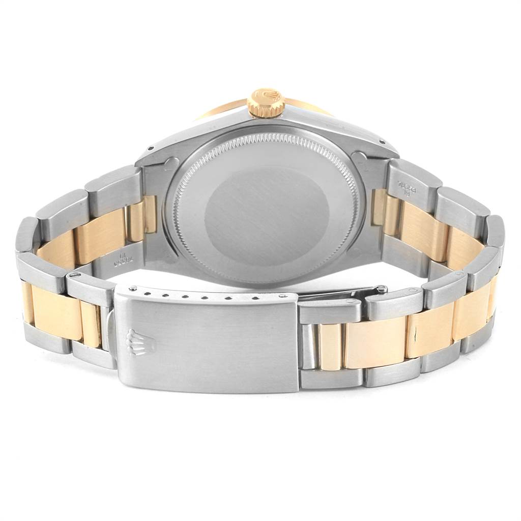 The image shows the back view of a Rolex Vintage Collection 1500 Men's Steel and Gold (two tone) Champagne Dial 1500 Men's Steel and Gold (two tone) Champagne Dial watch, highlighting the case back and two-tone bracelet and clasp.