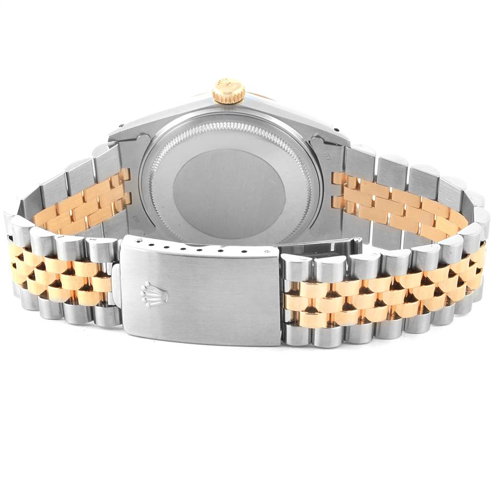 The image shows the back view of the case and two-tone metal bracelet of a Rolex Vintage Collection 16013 Men's Stainless Steel Silver Dial 16013 Men's Stainless Steel Silver Dial watch.