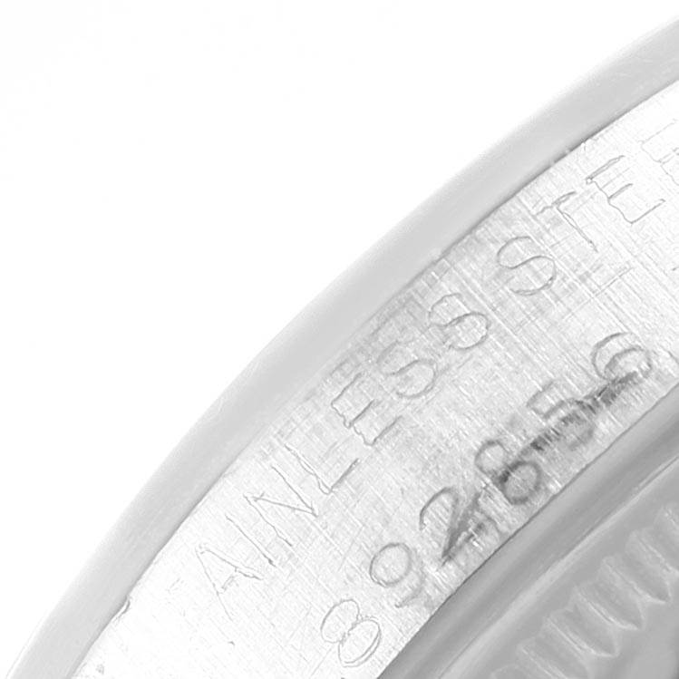 This close-up angle shows the engraved serial and text on the side of a Rolex Vintage Collection 5500 Men's Stainless Steel Silver Dial 5500 Men's Stainless Steel Silver Dial watch case.