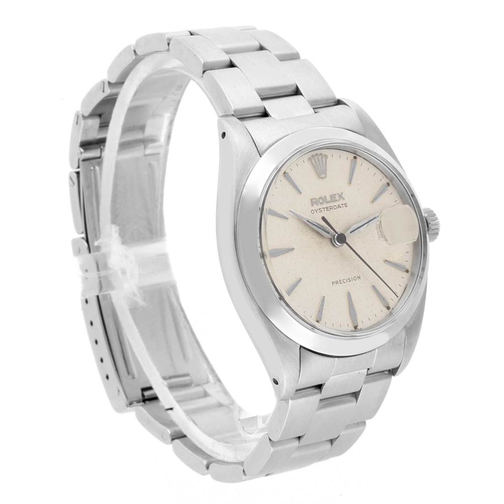 The image shows a side angle of a Rolex Vintage Collection 6694 Men's Stainless Steel Silver Dial 6694 Men's Stainless Steel Silver Dial model watch, displaying its face, bezel, bracelet, and clasp.