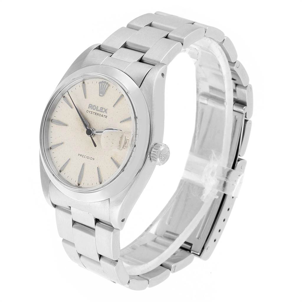 The image shows a side view of a Rolex Vintage Collection 6694 Men's Stainless Steel Silver Dial 6694 Men's Stainless Steel Silver Dial Oysterdate Precision watch, highlighting the dial, bracelet, and crown.