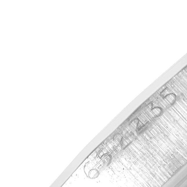 This close-up of the Rolex Vintage Collection 6694 Men's Stainless Steel Silver Dial 6694 Men's Stainless Steel Silver Dial model shows the inner bezel with engraved markings.