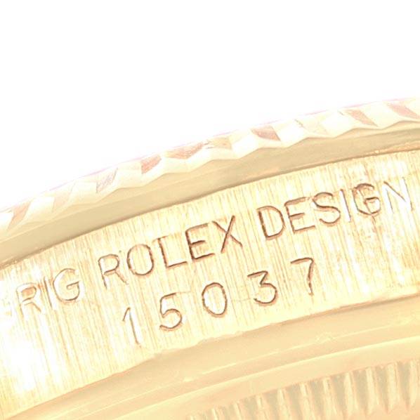 The image shows a close-up view of the engraved edge of a Rolex Vintage Collection 15037 Men's Yellow Gold Champagne Dial 15037 Men's Yellow Gold Champagne Dial model watch with the model number 15037.