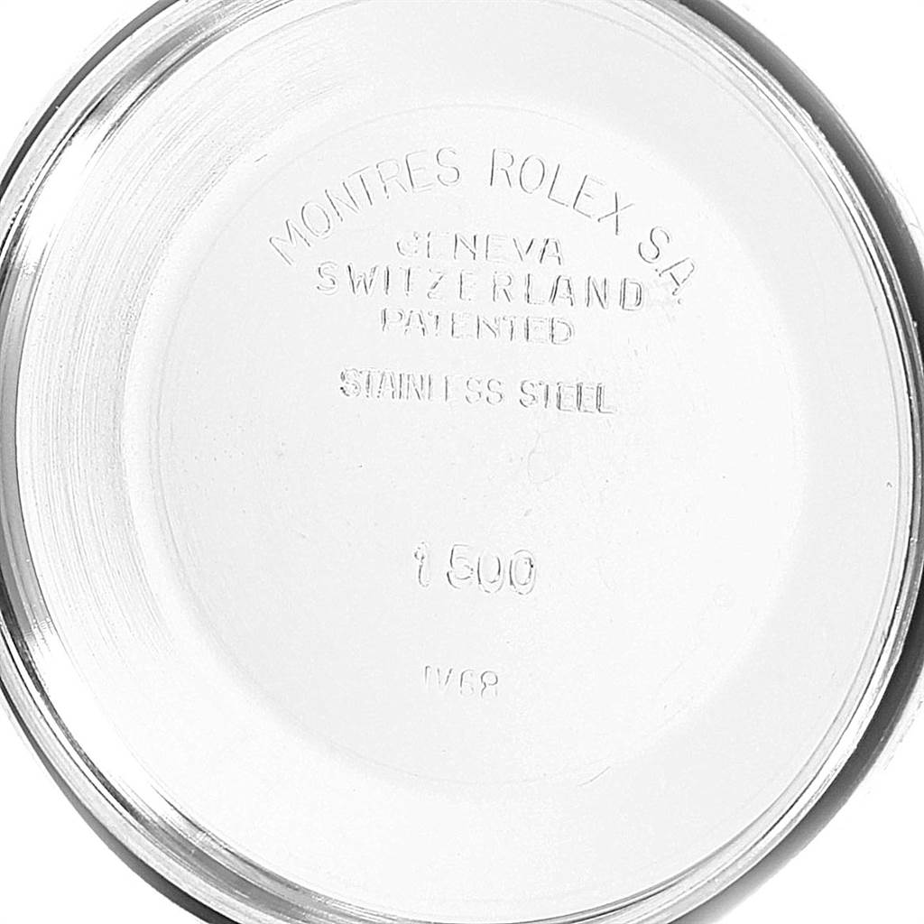 This image shows the inside case back of a Rolex Vintage Collection 1500 Men's Stainless Steel Silver Dial 1500 Men's Stainless Steel Silver Dial watch, revealing imprint details and material information.