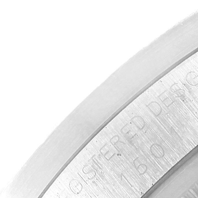 The image shows a close-up angle of the bezel of a Vintage Collection model Rolex watch.